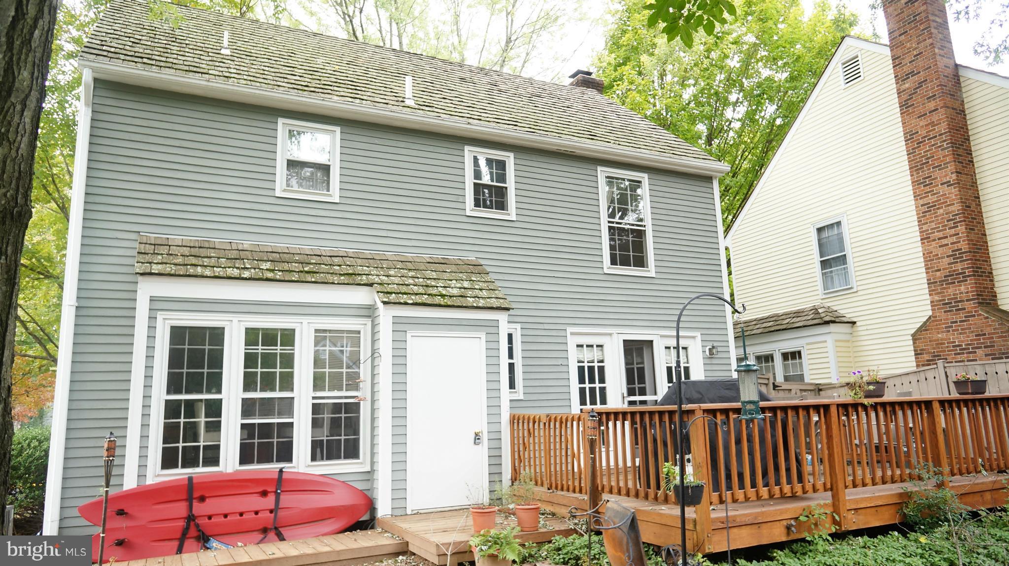 2117 Salt Kettle Way Reston, VA 20191 - Photo 3 of 30 a view of a house with a wooden deck and a yard