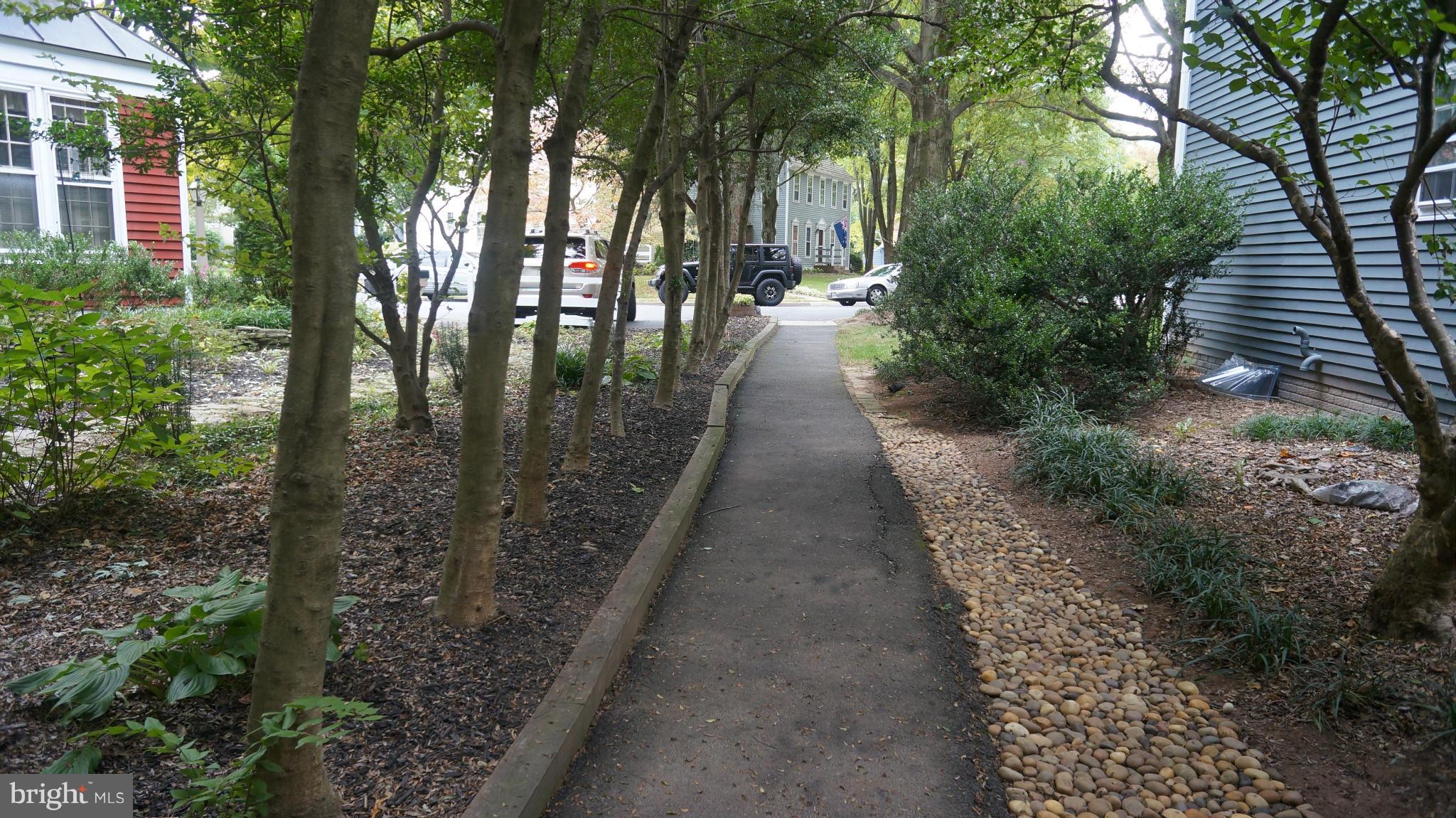 2117 Salt Kettle Way Reston, VA 20191 - Photo 28 of 30 a view of a pathway with a yard of house