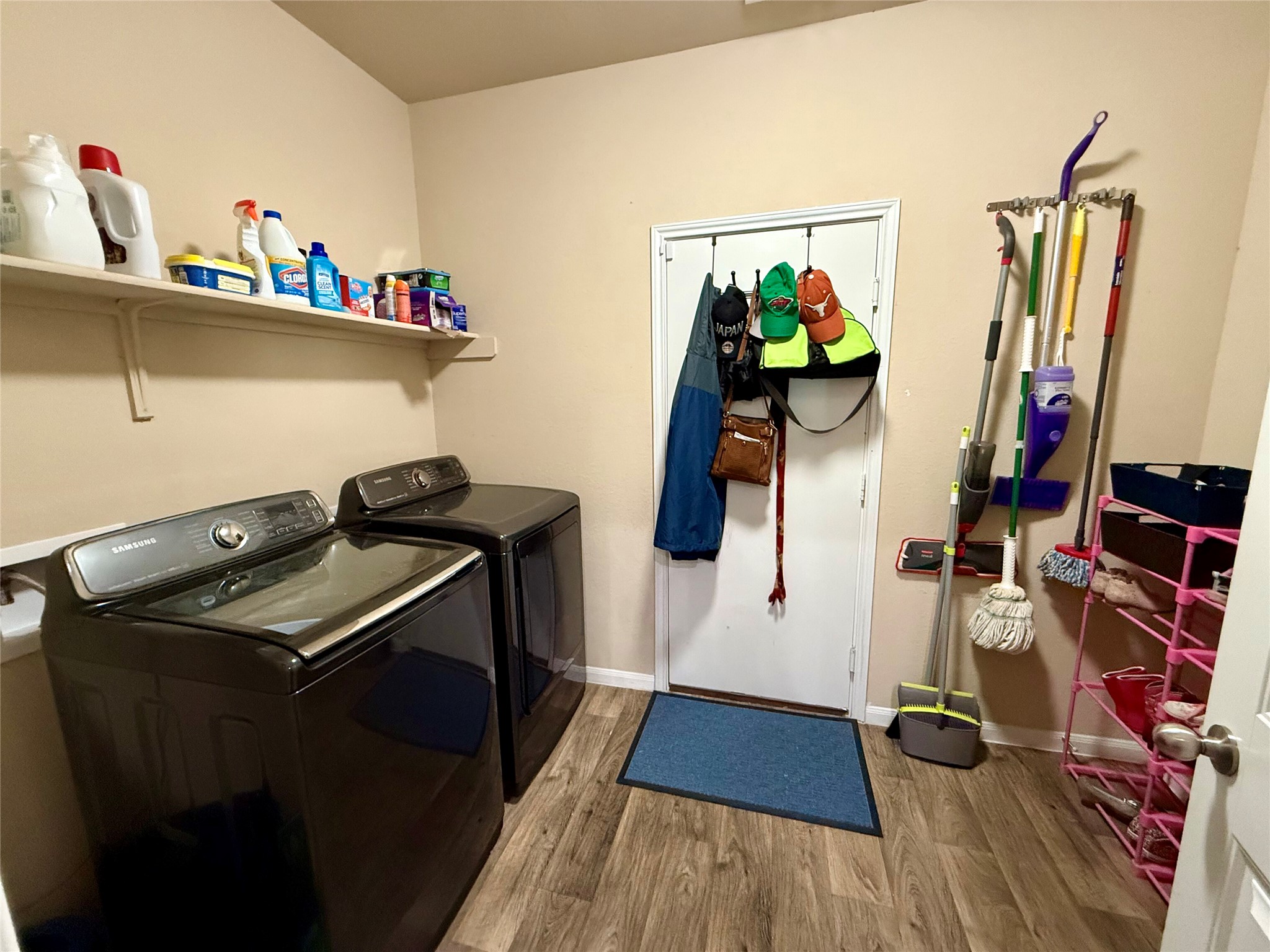 11700 Andesite Road Manor, TX 78653 - Photo 14 of 32 Functional utility room with durable flooring and ample storage for daily essentials.