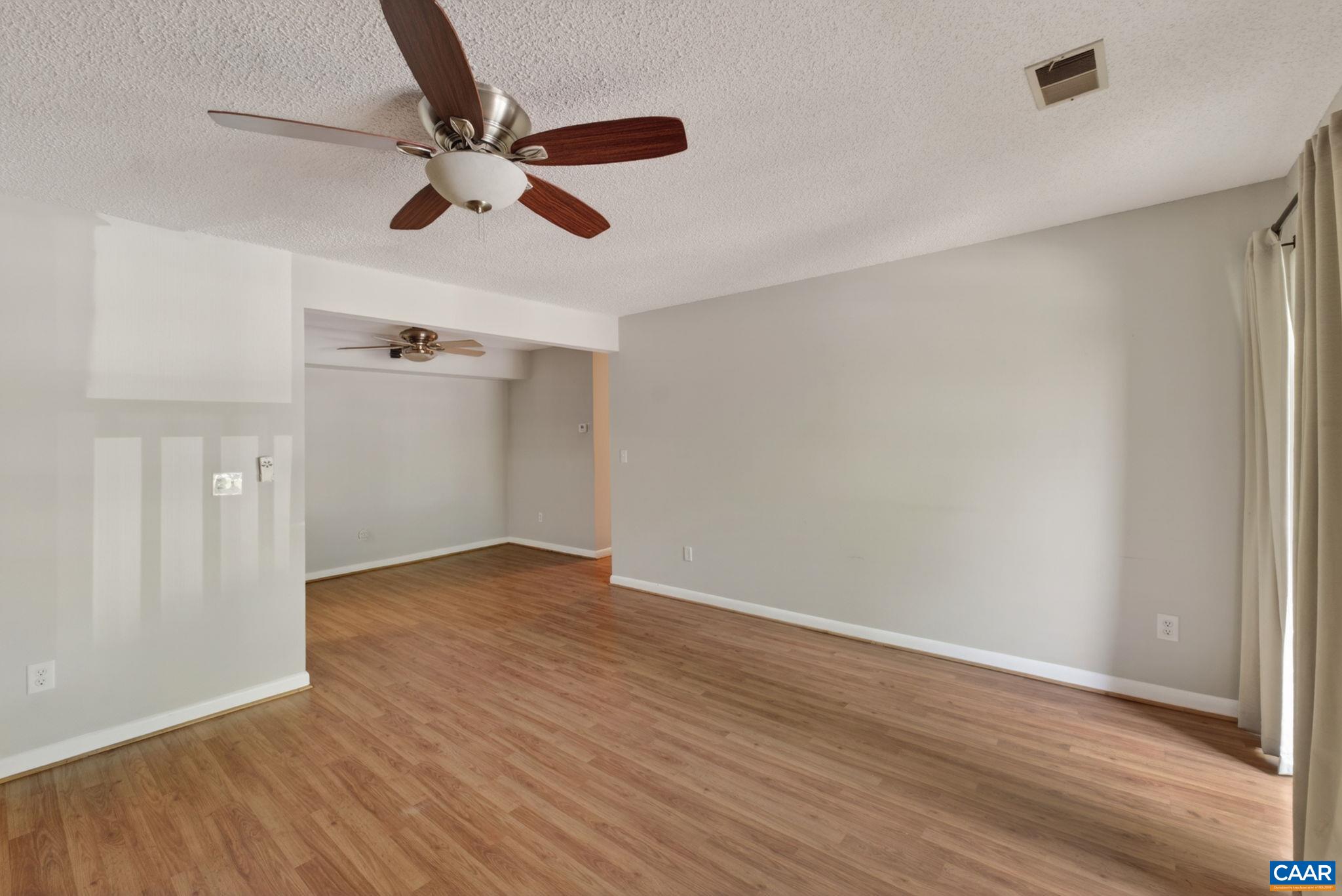 103 Turtle Creek Road, Unit 8 Charlottesville, VA 22901 - Photo 7 of 37 wooden floor in an empty room