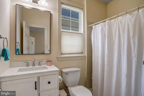 a workspace with furniture and a window