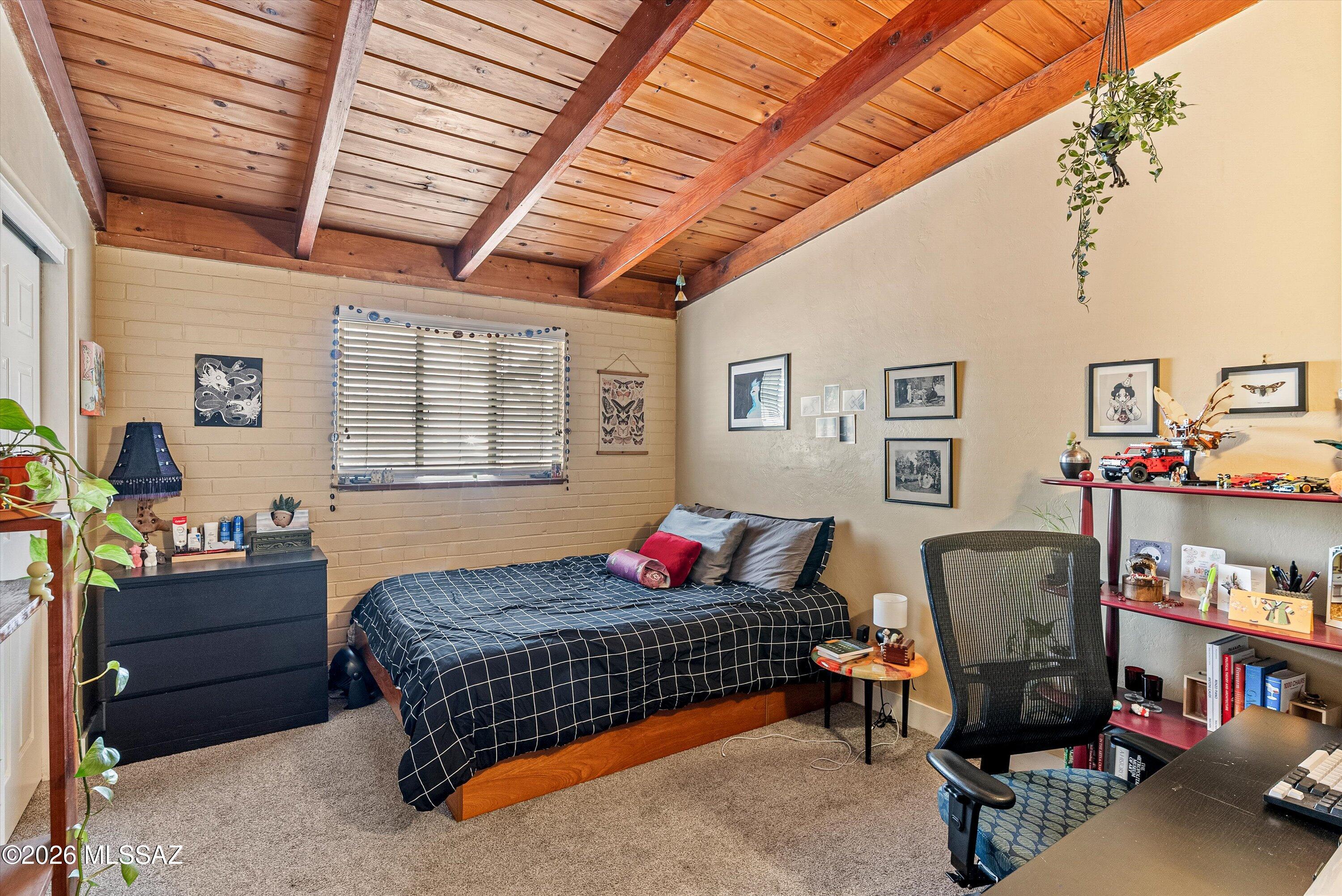 2934 East Exeter Street Tucson, AZ 85716 - Photo 10 of 20 a bedroom with furniture and a window