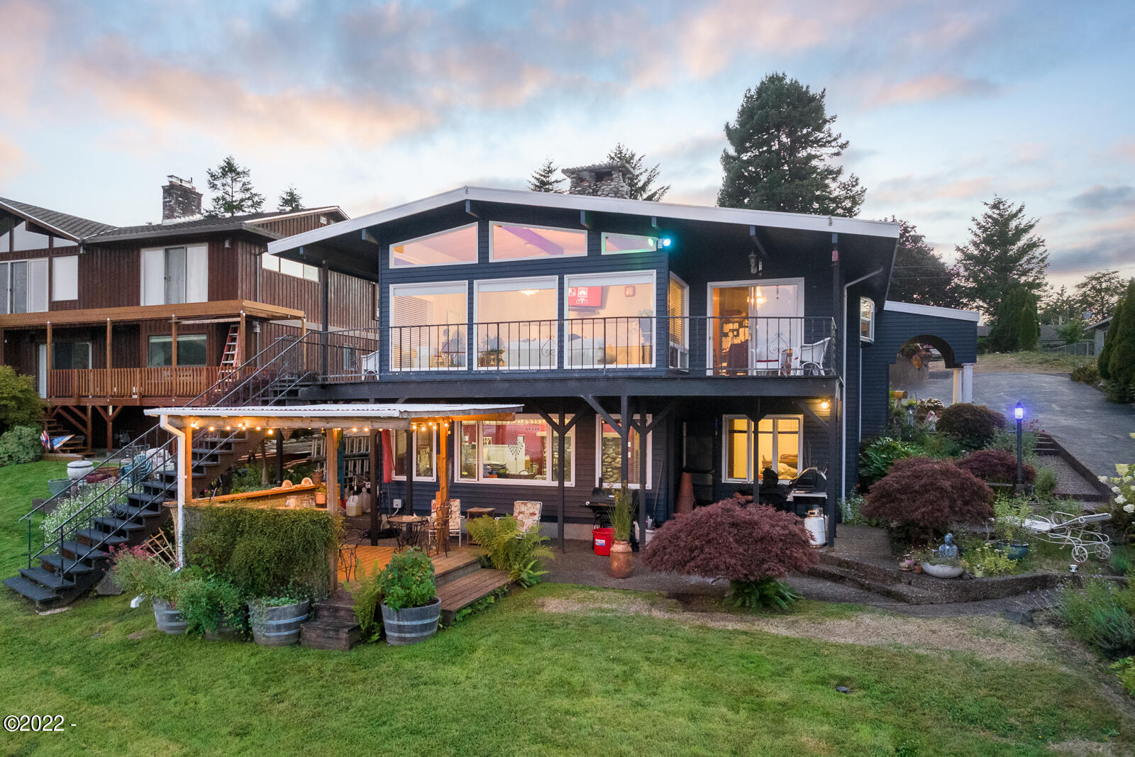 3131 Northeast Johns Loop Neotsu, OR 97364 - Photo 2 of 38 Front View facing lake