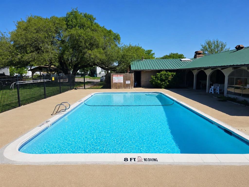 2900 Interstate 35, Unit 80 Waco, TX 76706 - Photo 10 of 10 a view of swimming pool with seating area