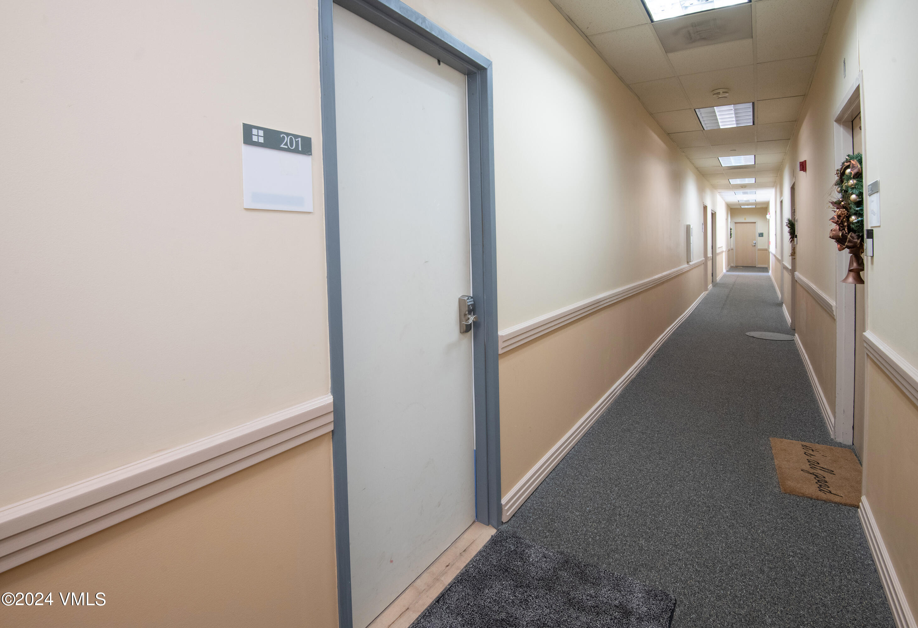 70 Benchmark Road, Unit 201 Avon, CO 81620 - Photo 14 of 32 a view of hallway with stairs
