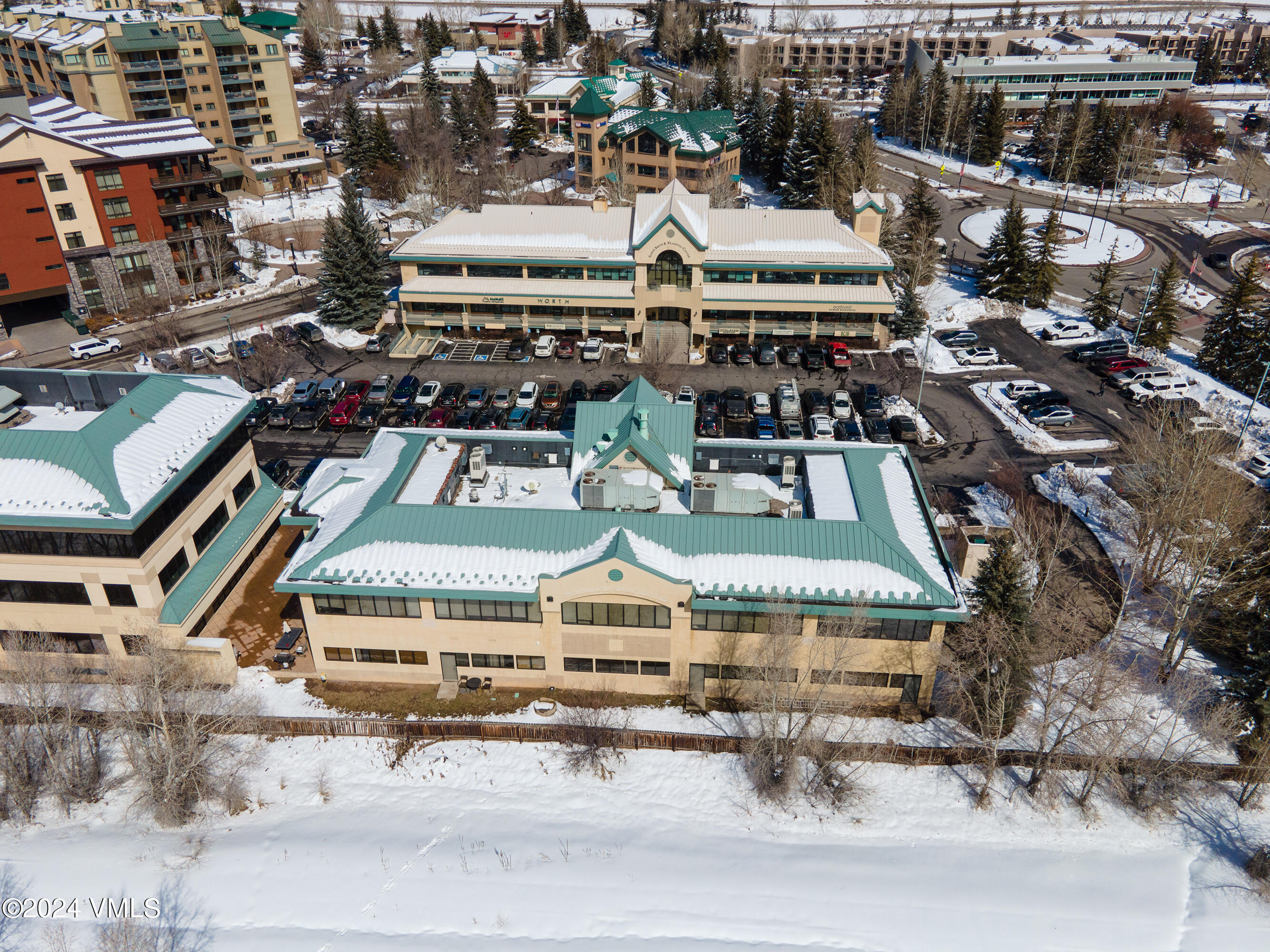 70 Benchmark Road, Unit 201 Avon, CO 81620 - Photo 28 of 32 a picture of a building with a garden