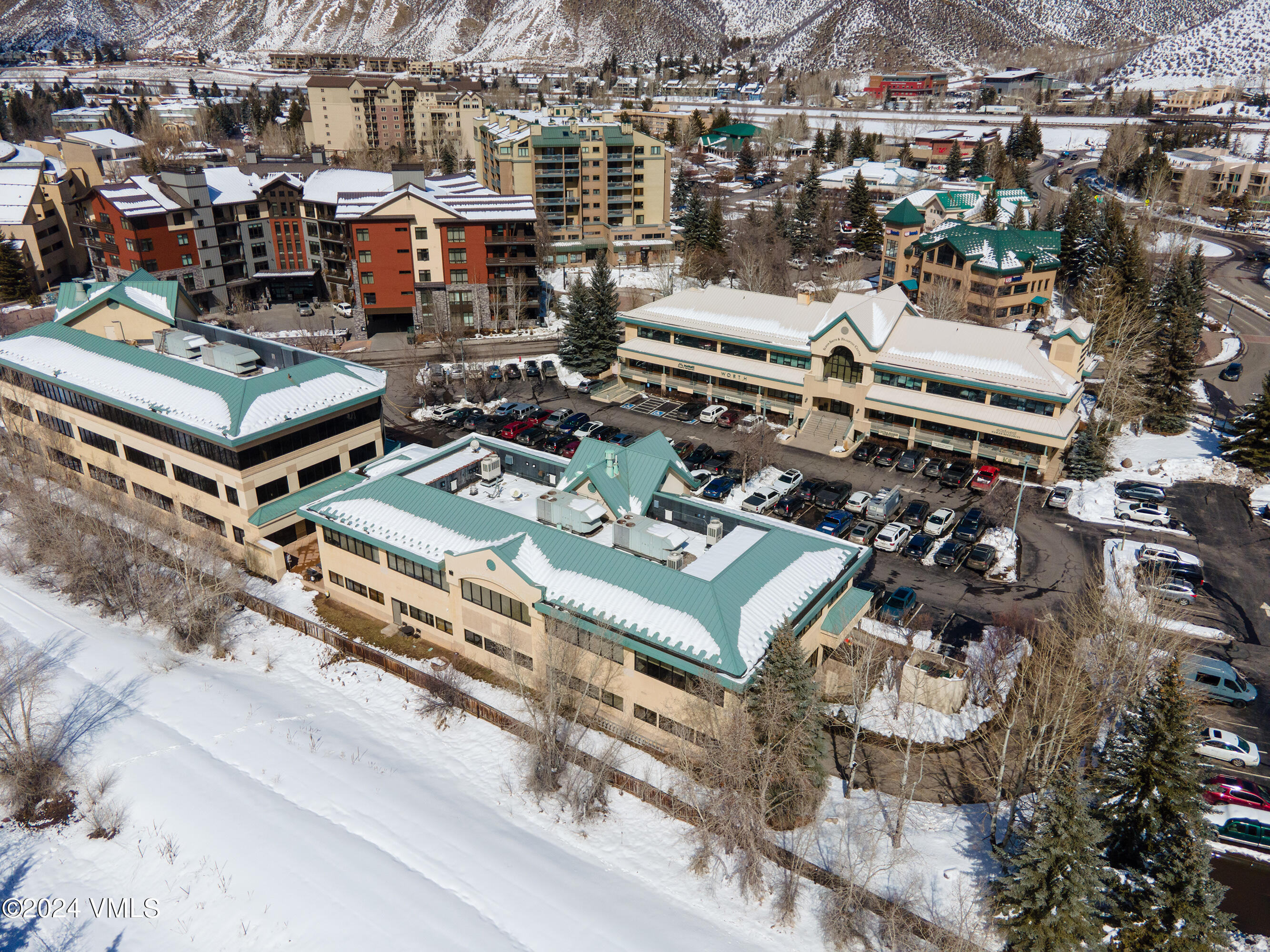70 Benchmark Road, Unit 201 Avon, CO 81620 - Photo 29 of 32 an aerial view of a city with lots of residential buildings
