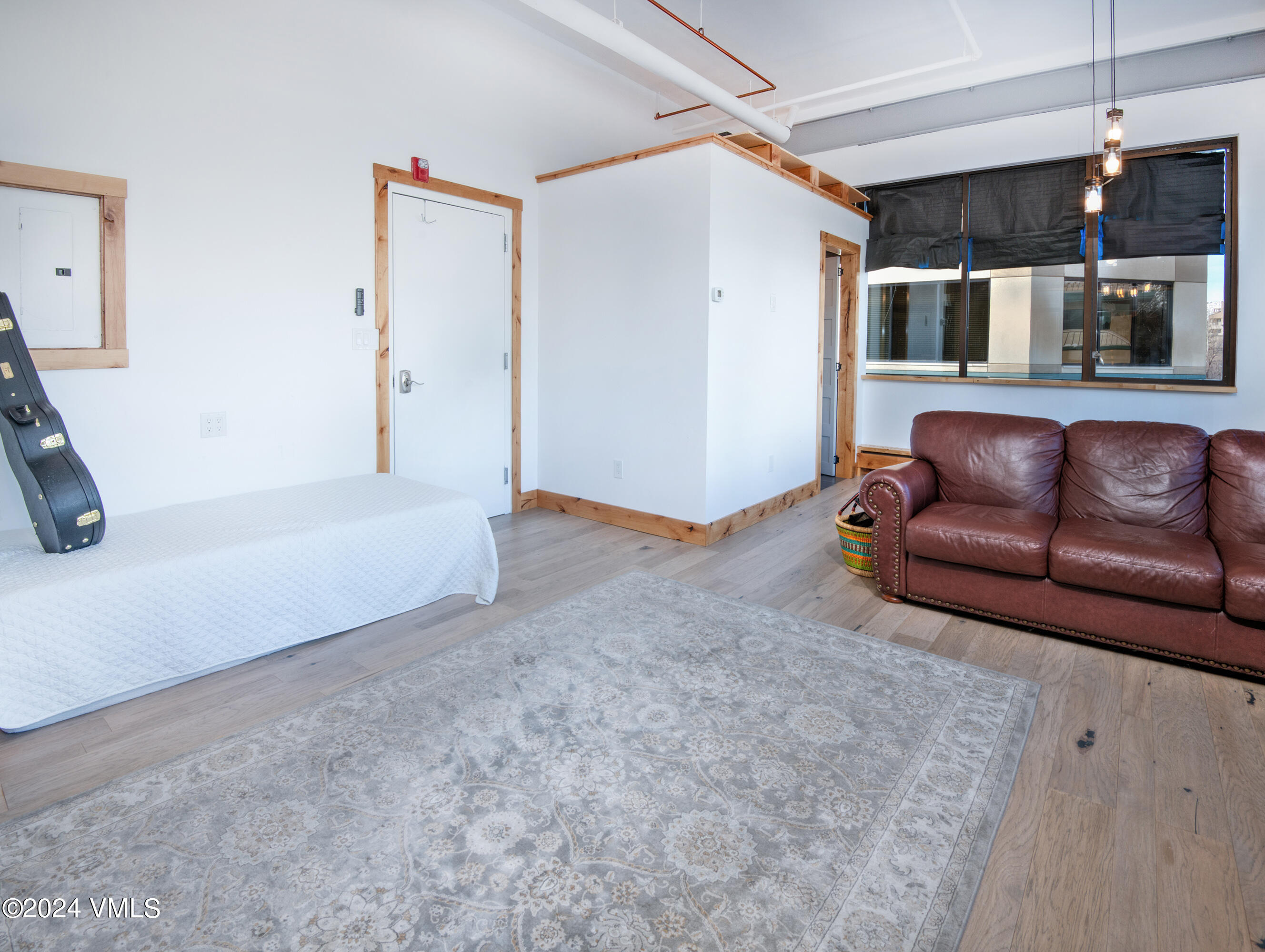 70 Benchmark Road, Unit 201 Avon, CO 81620 - Photo 5 of 32 a living room with furniture