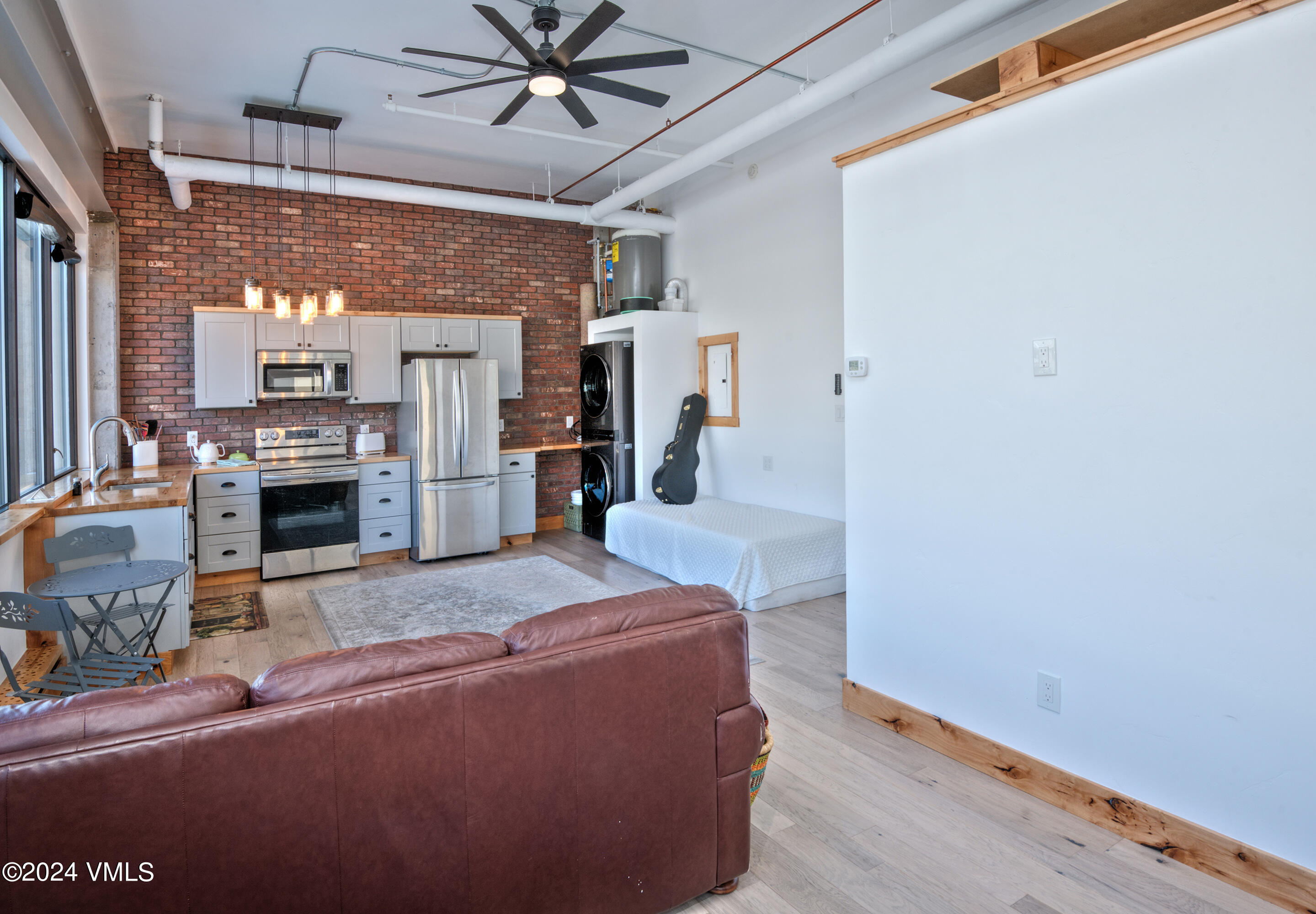70 Benchmark Road, Unit 201 Avon, CO 81620 - Photo 6 of 32 a view of living room with furniture and fireplace