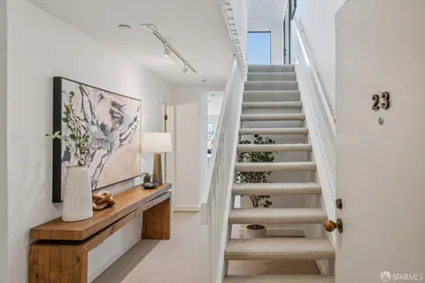 a view of a hallway with front door