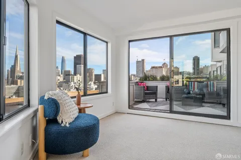 a view of balcony with furniture