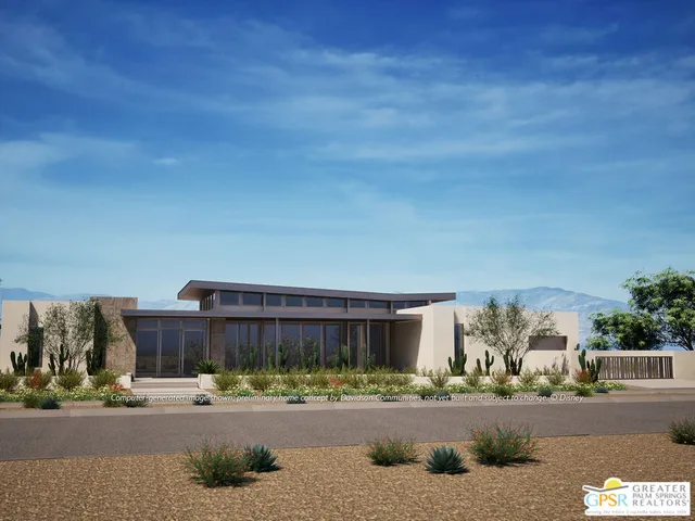 a view of a house next to a yard