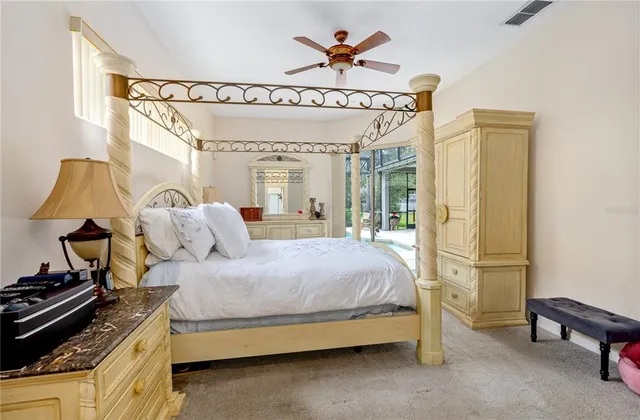 a spacious bathroom with a granite countertop sink a large mirror and a bathtub with shower