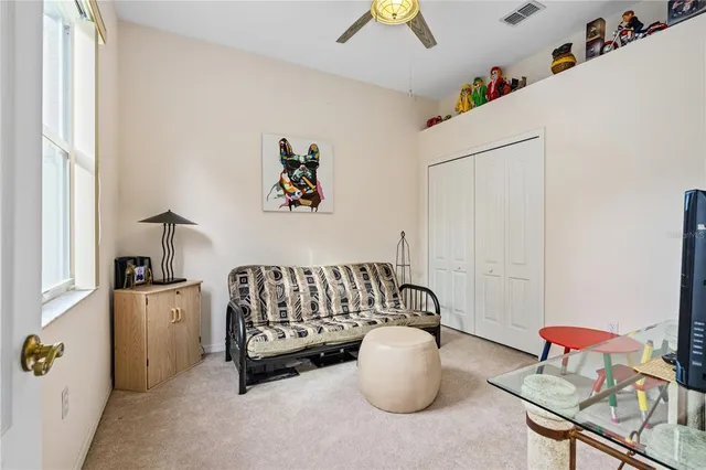 a bathroom with a sink mirror vanity and toilet