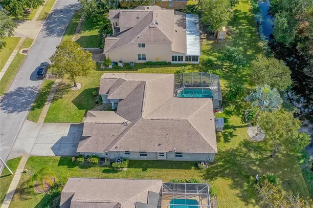 an aerial view of residential building with outdoor space