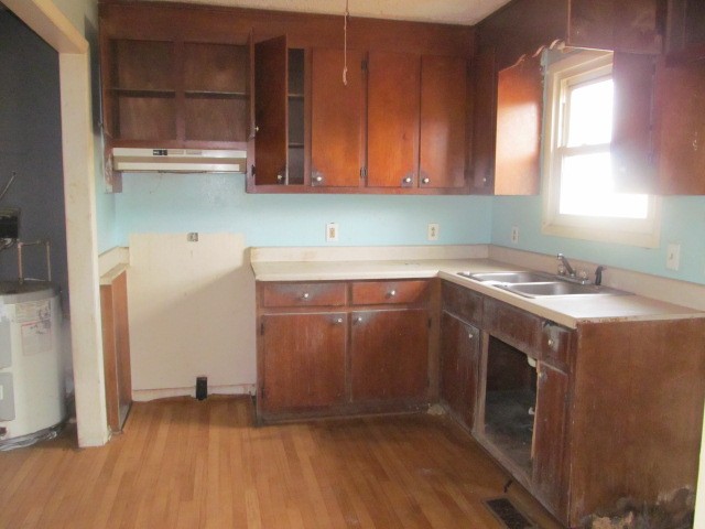 868 Barnette Road Minor Hill, TN 38473 - Photo 3 of 9 a kitchen with a sink cabinets and a window