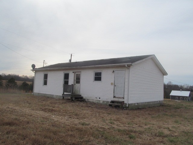 868 Barnette Road Minor Hill, TN 38473 - Photo 9 of 9 a house view with a backyard