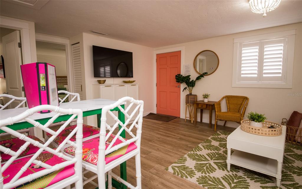 1805 Ivanhoe Street Sarasota, FL 34231 - Photo 19 of 34 a living room with furniture and a flat screen tv