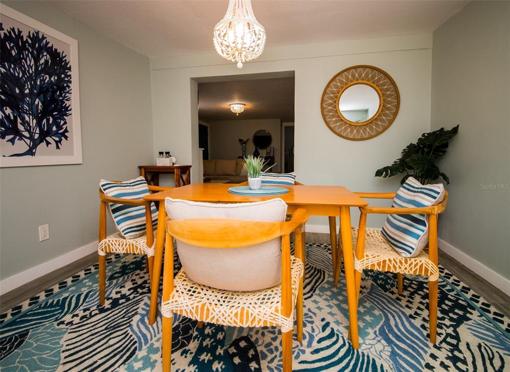 1805 Ivanhoe Street Sarasota, FL 34231 - Photo 29 of 34 a view of a dining room with furniture