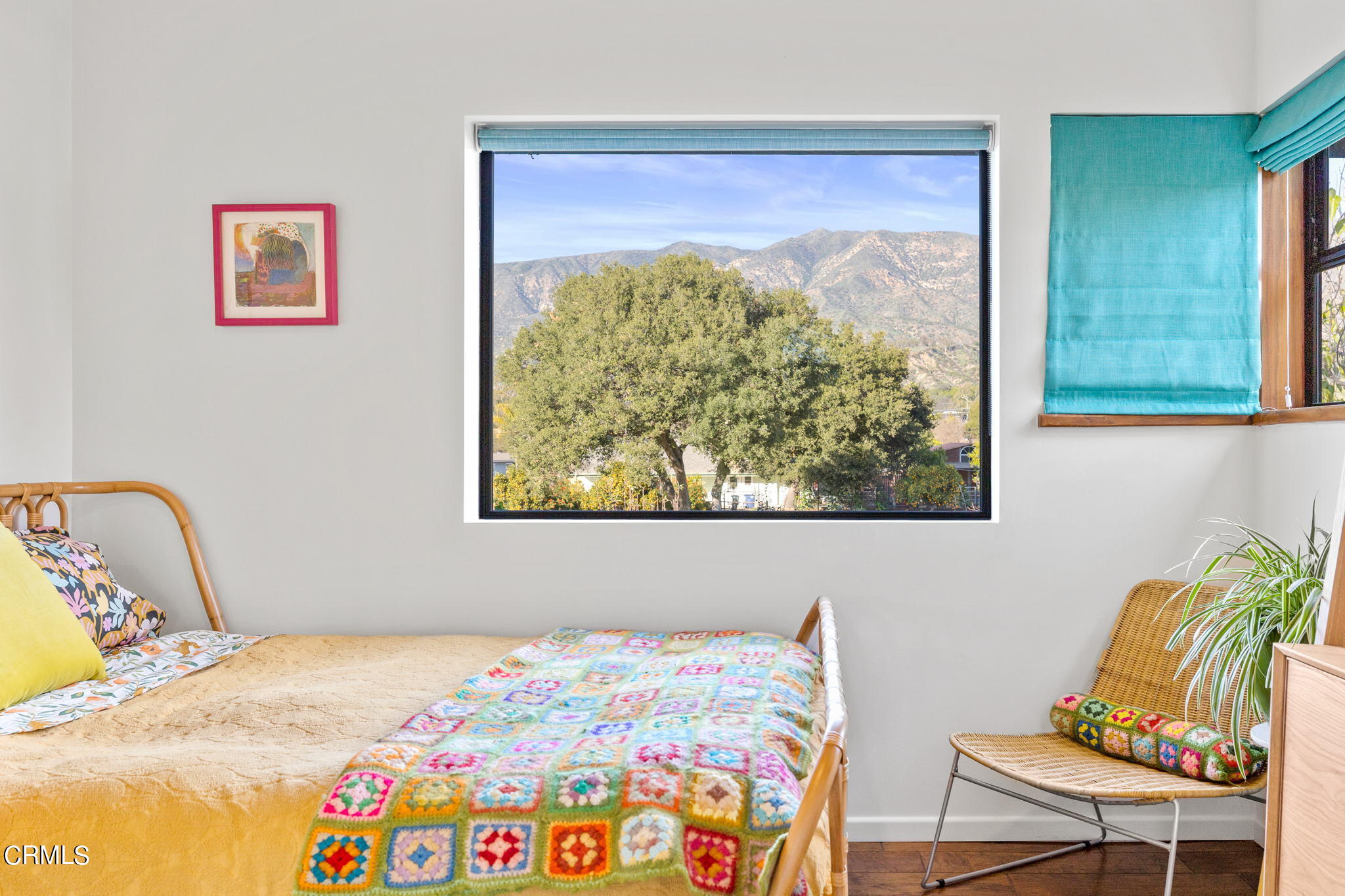 332 North Rice Road Ojai, CA 93023 - Photo 19 of 50 a bedroom with a bed and painting on the wall