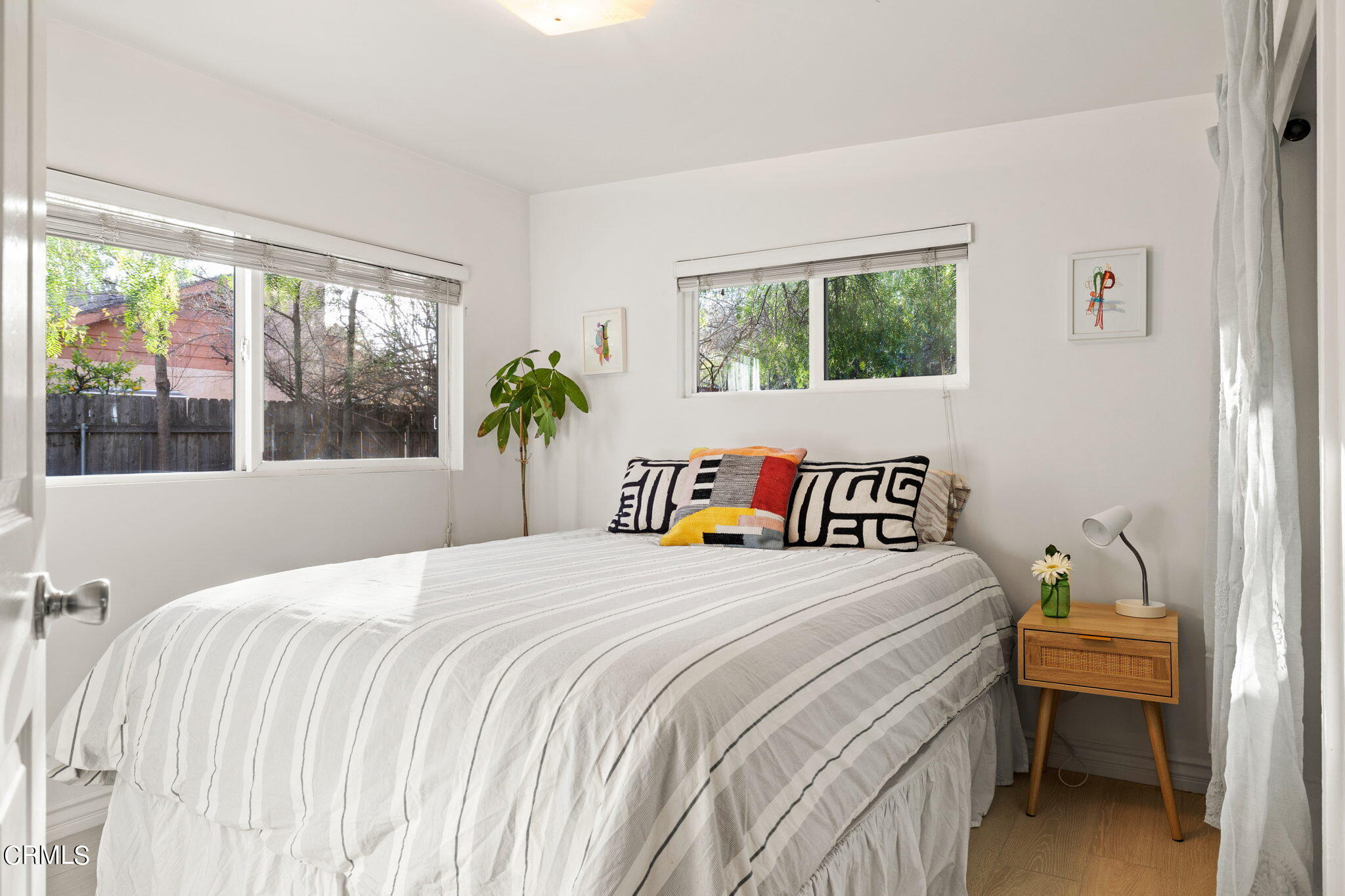 332 North Rice Road Ojai, CA 93023 - Photo 33 of 50 a bedroom with a bed and a window