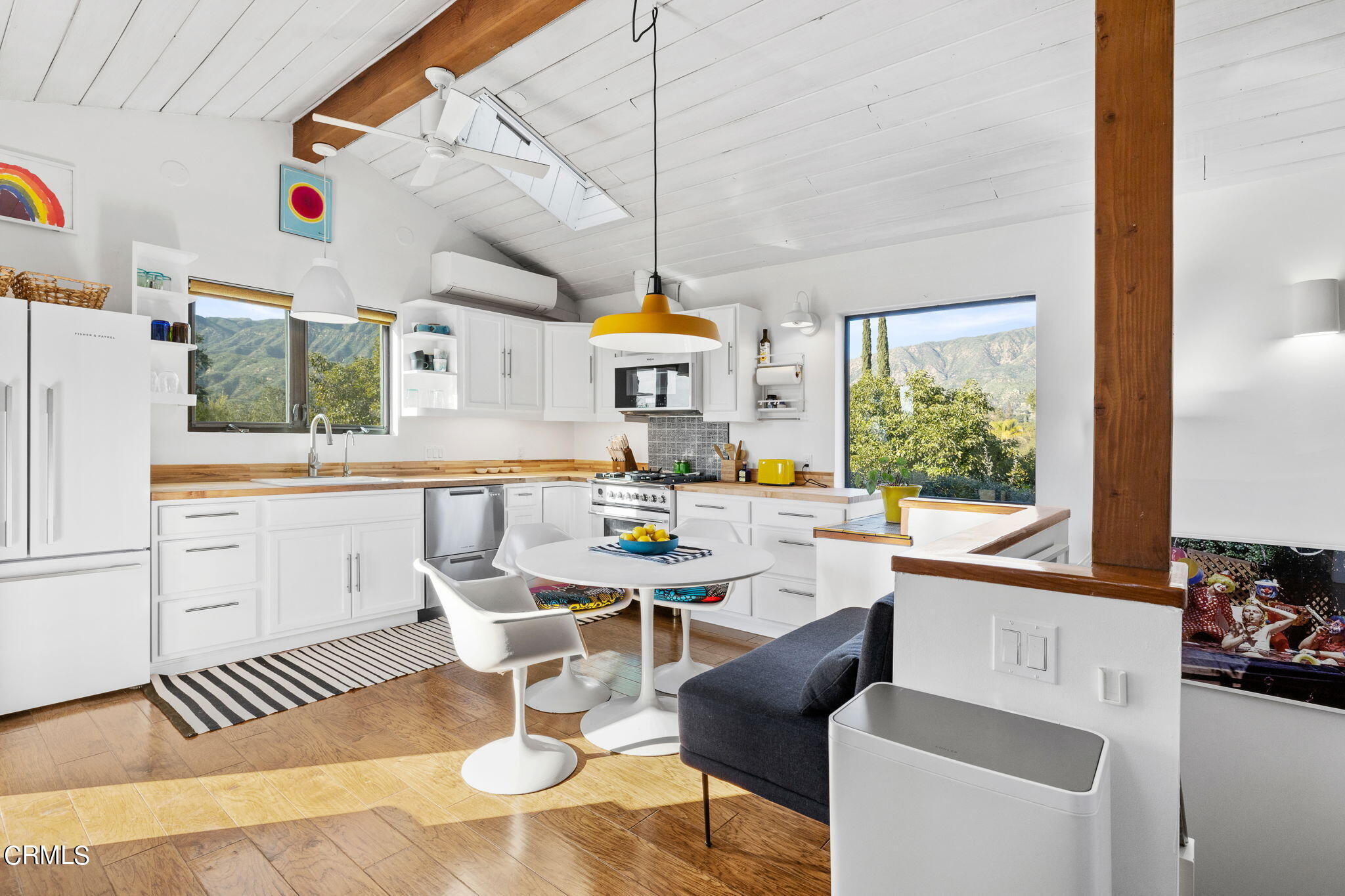 332 North Rice Road Ojai, CA 93023 - Photo 8 of 50 a kitchen with a stove a sink and a refrigerator