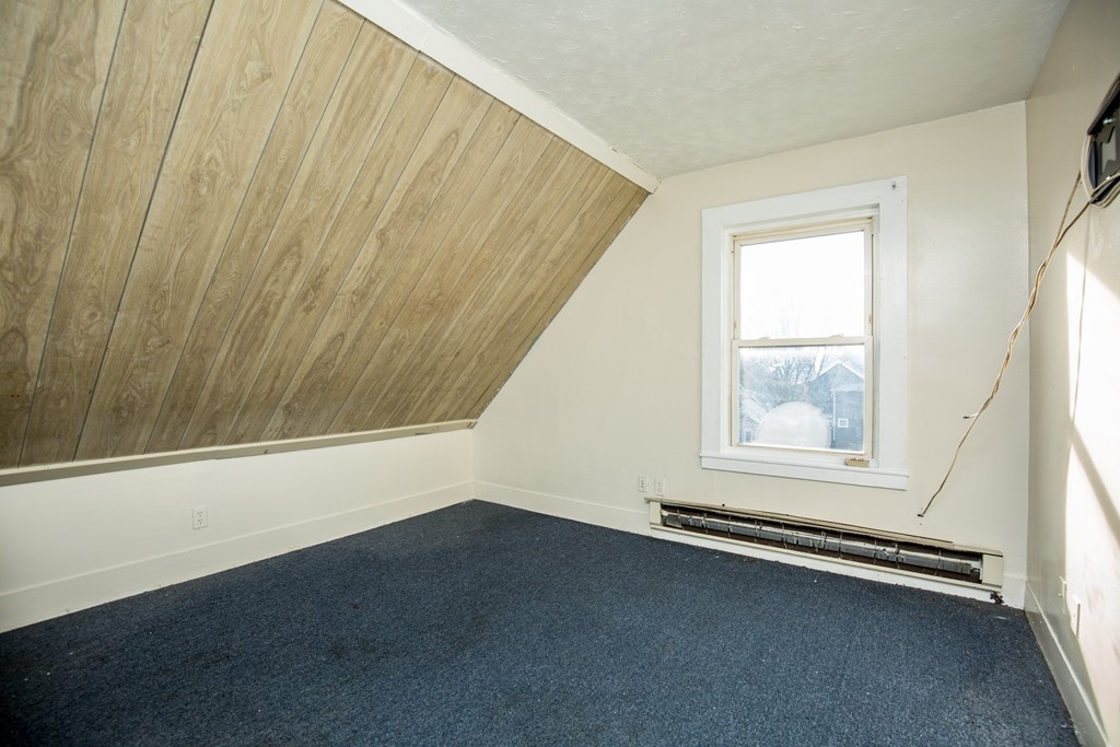 11 Phillips Avenue Lynn, MA 01902 - Photo 14 of 15 an empty room with a window