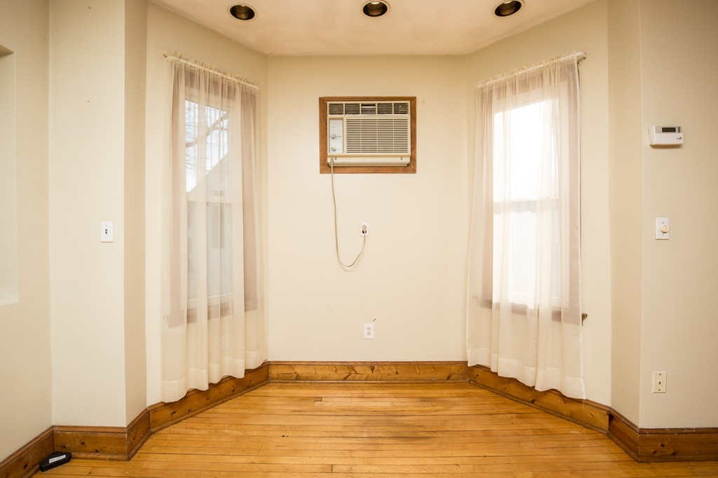 11 Phillips Avenue Lynn, MA 01902 - Photo 8 of 15 a view of a bedroom with closet