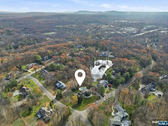 an aerial view of a house with a outdoor space