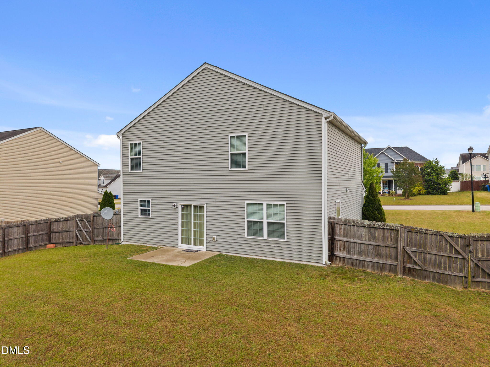 45 Crane Way Bunnlevel, NC 28323 - Photo 32 of 35 a view of a house with a backyard