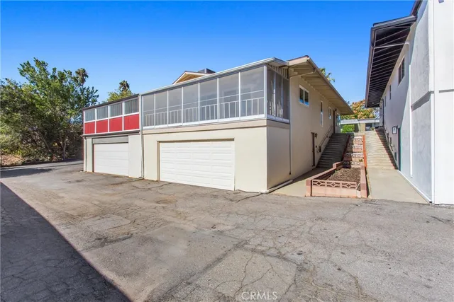 a view of a house with a park