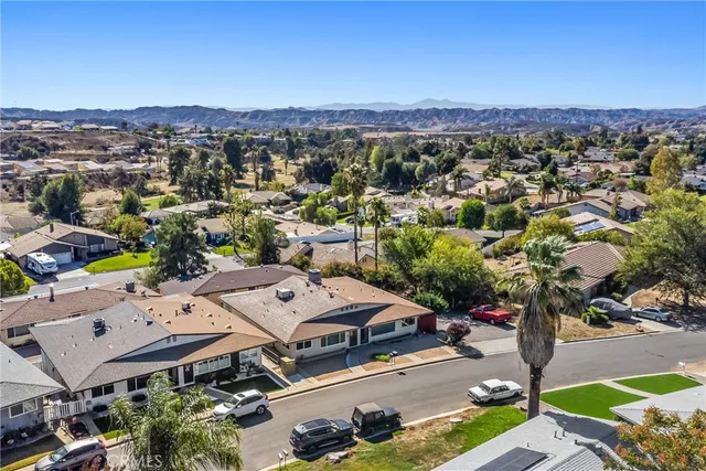 an aerial view of a city with lots of residential buildings