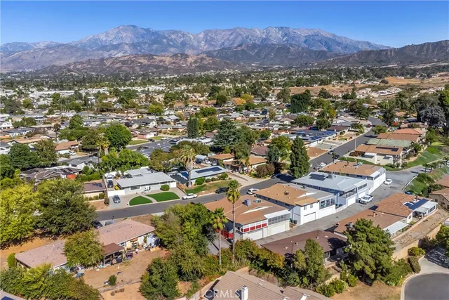 an aerial view of residential houses and outdoor space