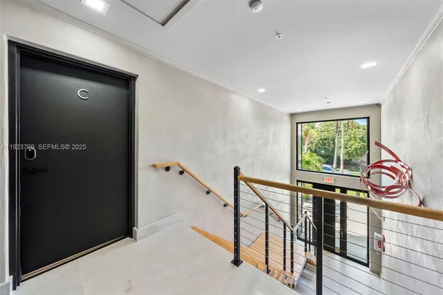 a view of an entryway with a window
