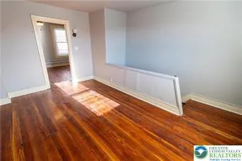 a view of an empty room and window