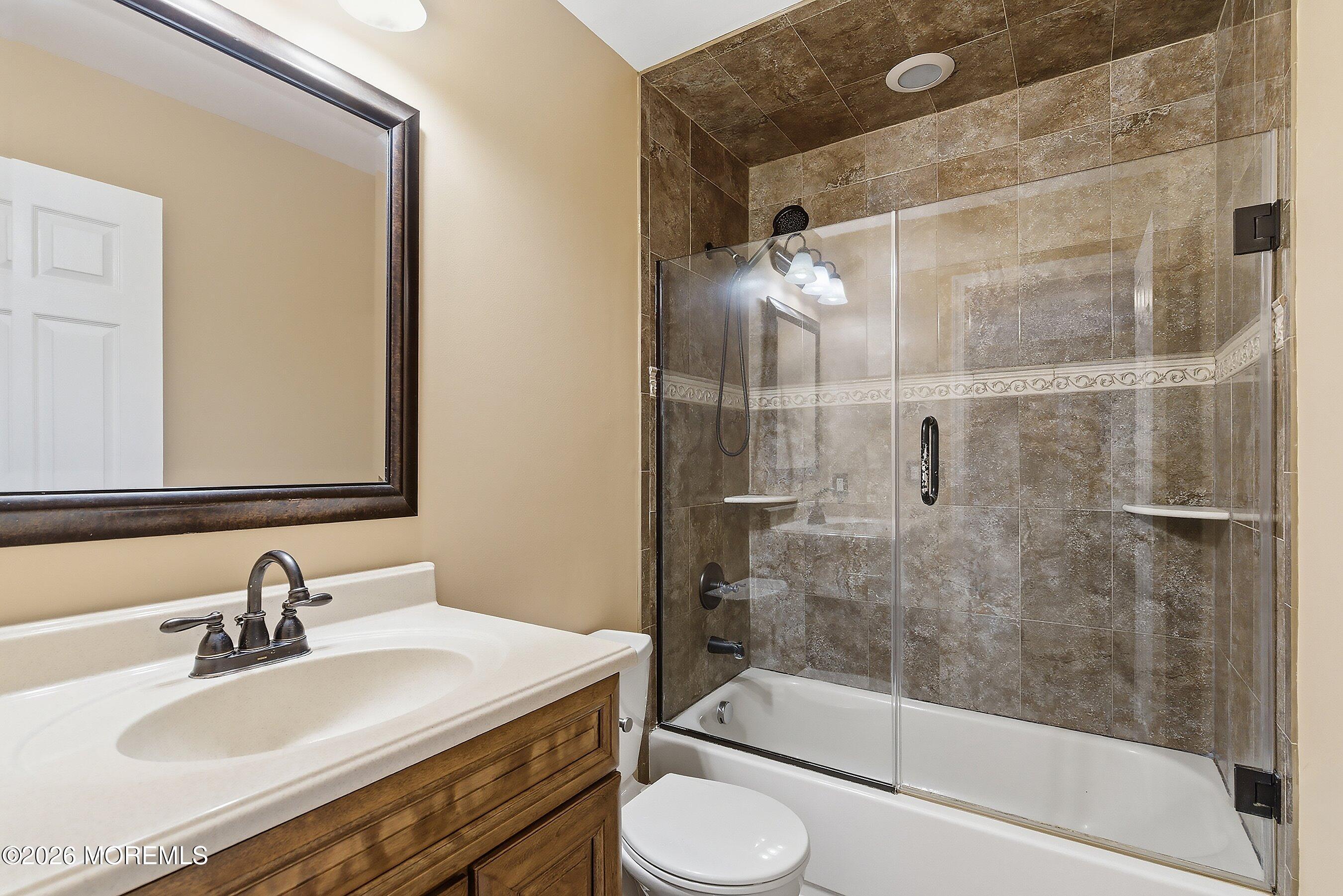 7 Metedeconk Road Howell, NJ 07731 - Photo 24 of 44 a bathroom with a sink toilet and shower