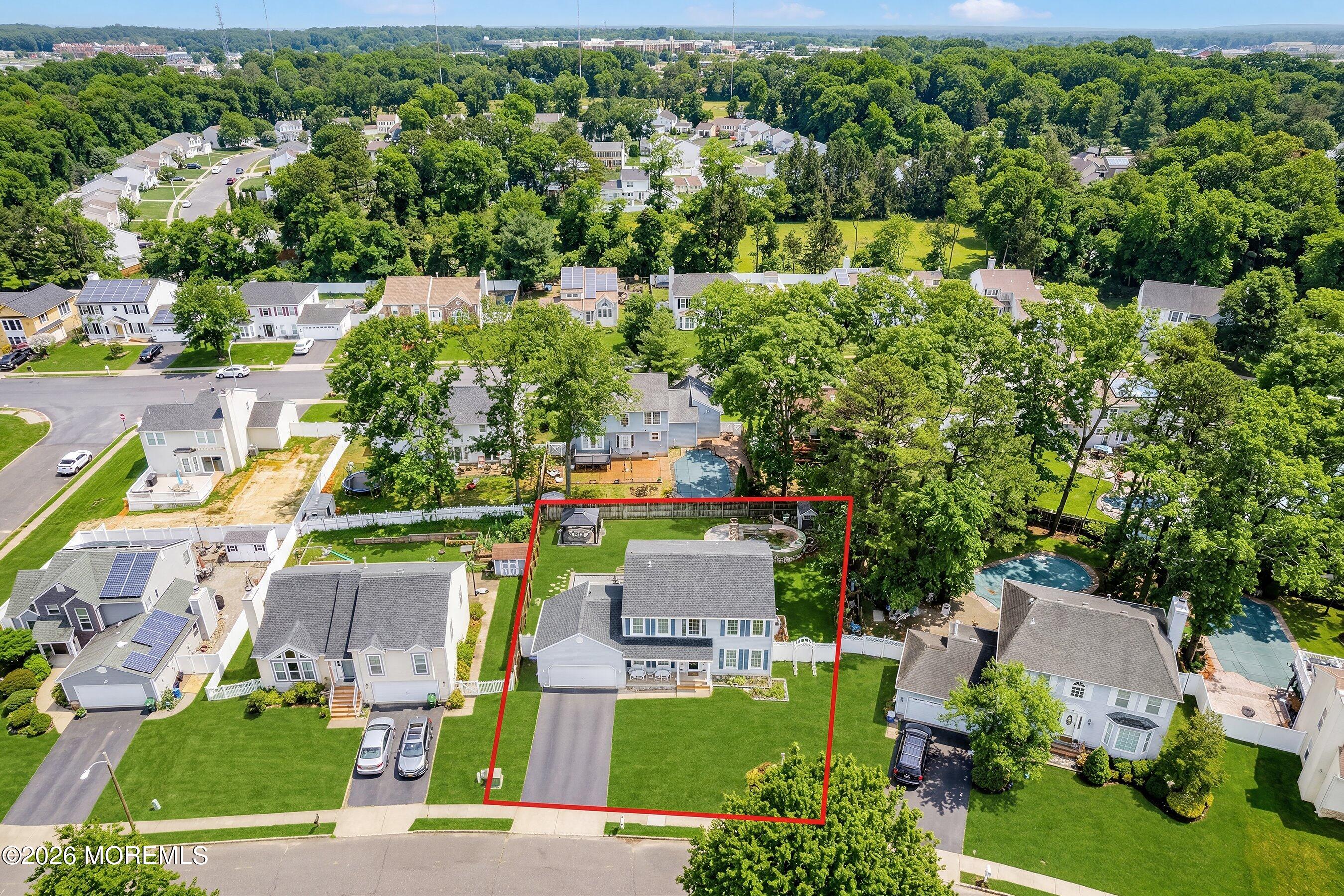 7 Metedeconk Road Howell, NJ 07731 - Photo 3 of 44 an aerial view of residential houses with outdoor space and street view
