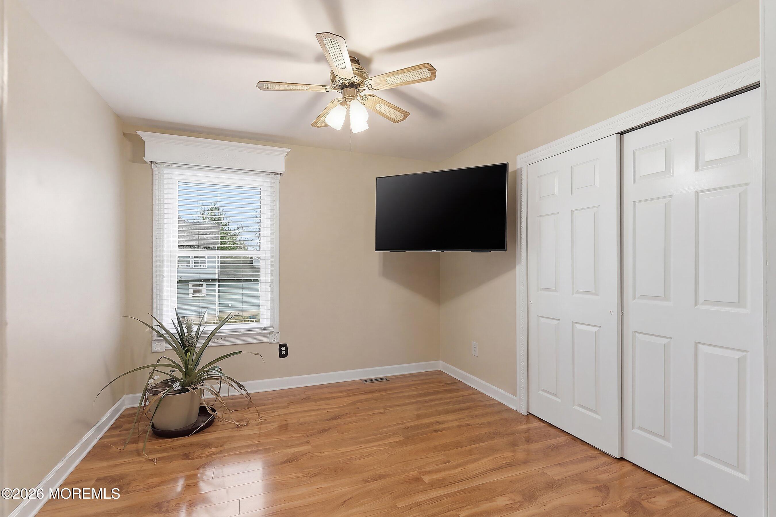 7 Metedeconk Road Howell, NJ 07731 - Photo 31 of 44 a view of a livingroom with a flat screen tv