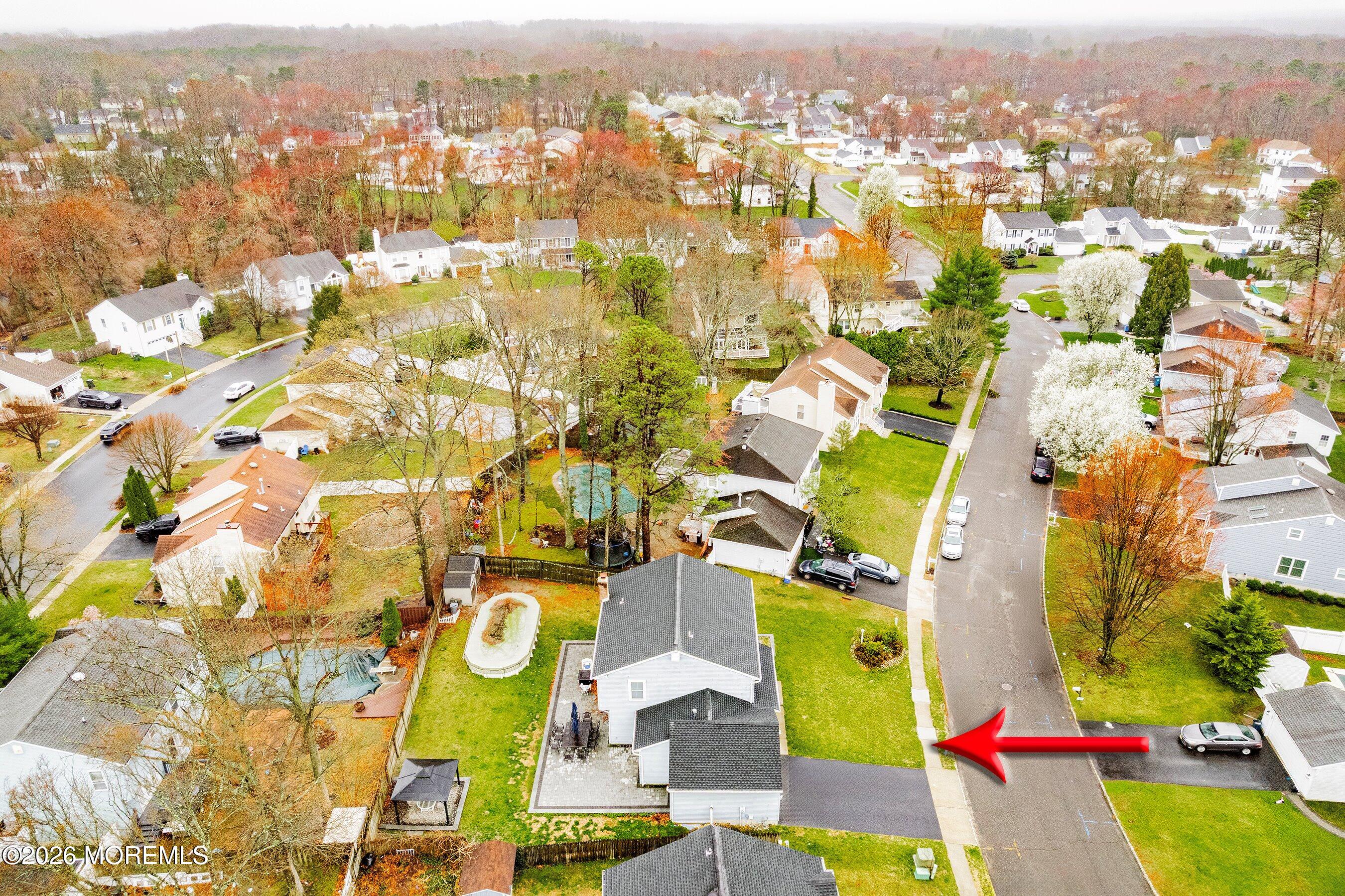 7 Metedeconk Road Howell, NJ 07731 - Photo 40 of 44 an aerial view of residential houses with outdoor space