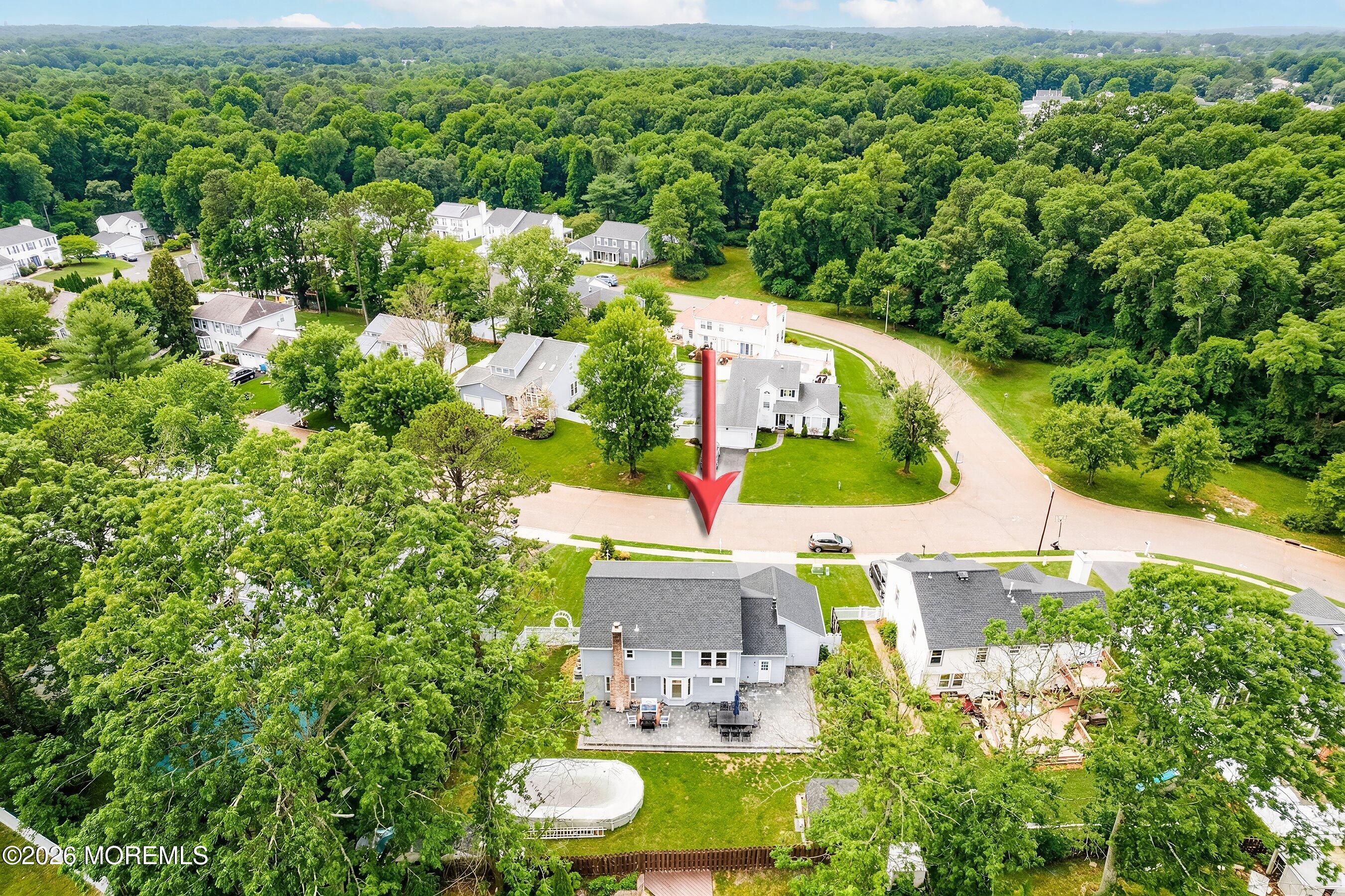 7 Metedeconk Road Howell, NJ 07731 - Photo 6 of 44 an aerial view of a house with a yard and lake view