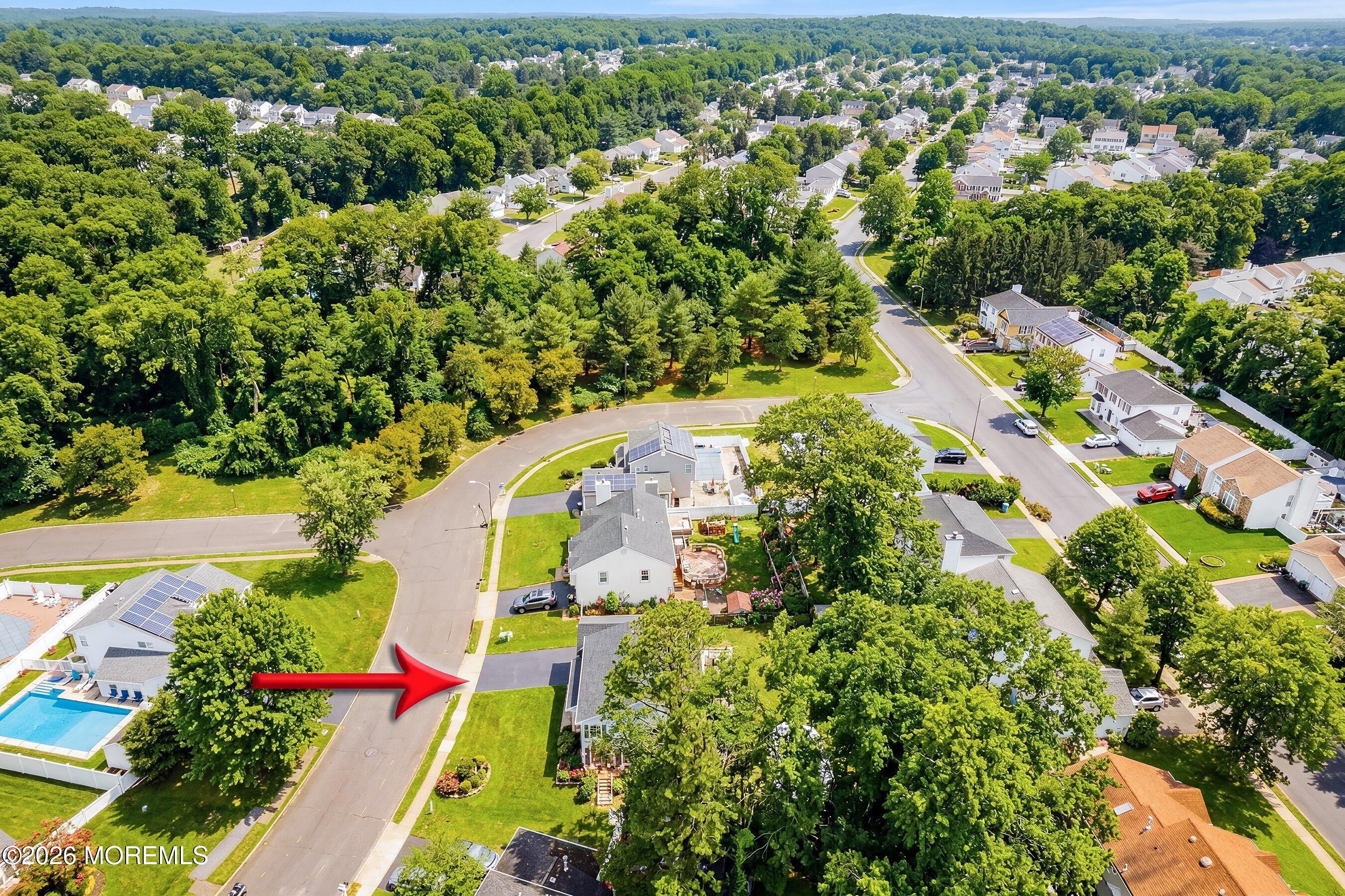 7 Metedeconk Road Howell, NJ 07731 - Photo 7 of 44 an aerial view of a house with a yard and lake view