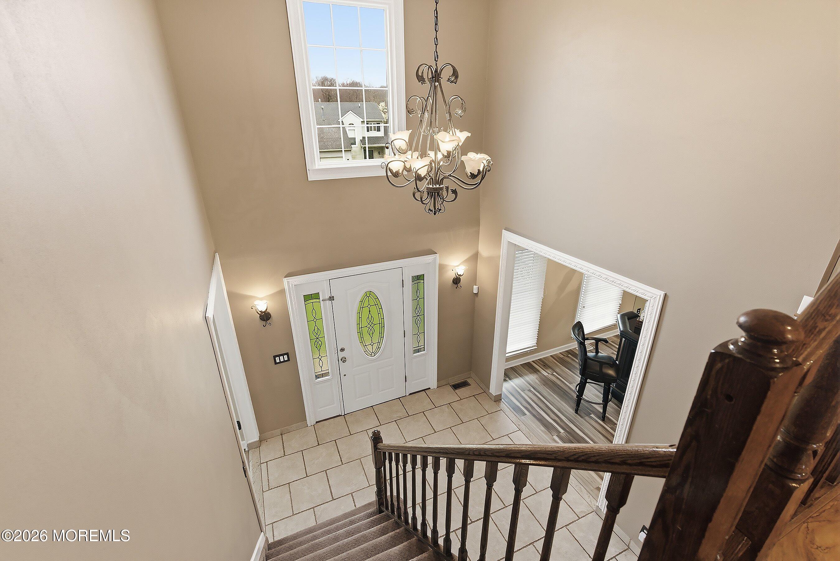 7 Metedeconk Road Howell, NJ 07731 - Photo 10 of 44 a view of an entryway with wooden floor