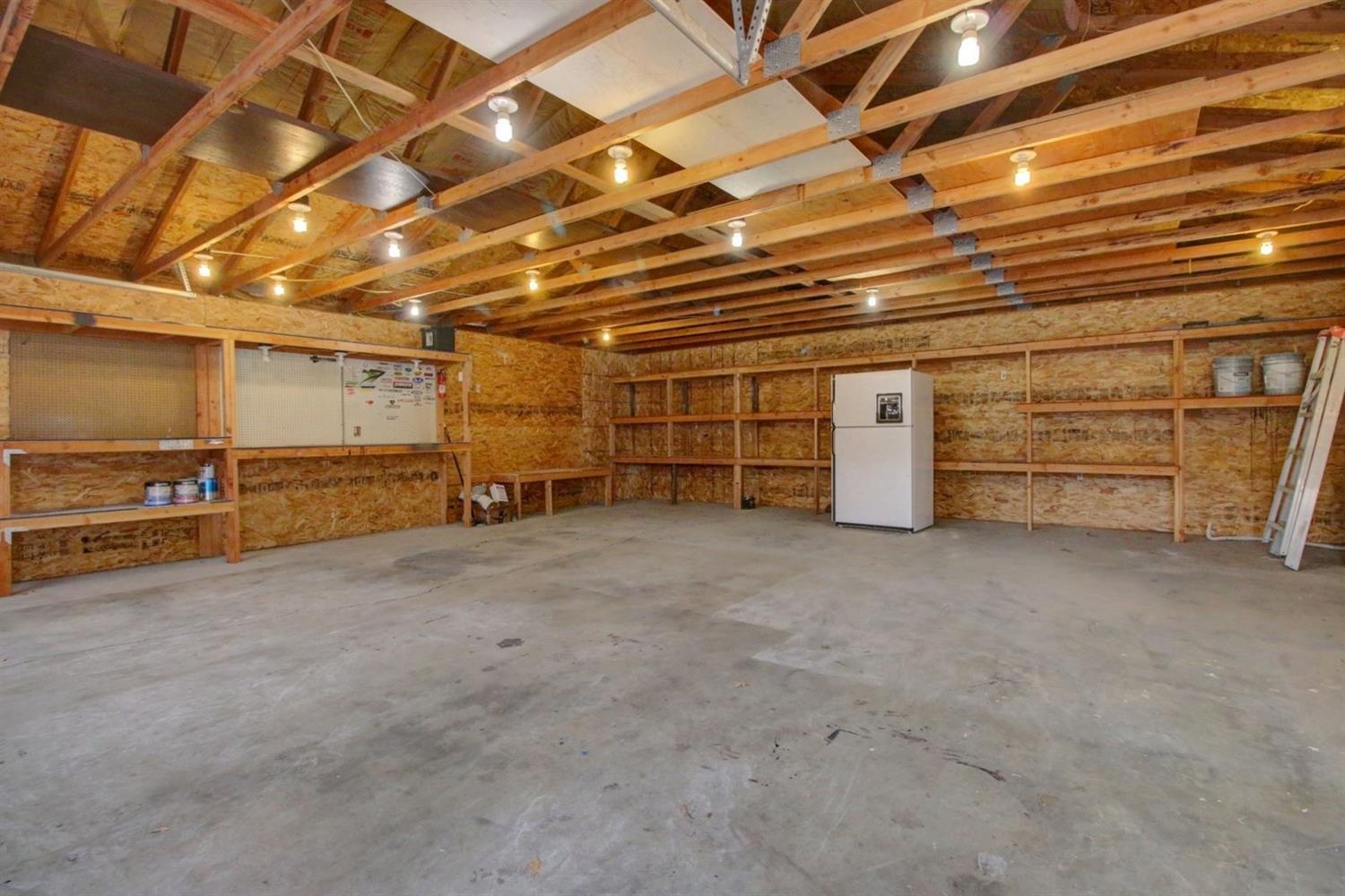 16565 Shiloh Road White City, OR 97503 - Photo 15 of 19 a view of empty room with wooden ceiling