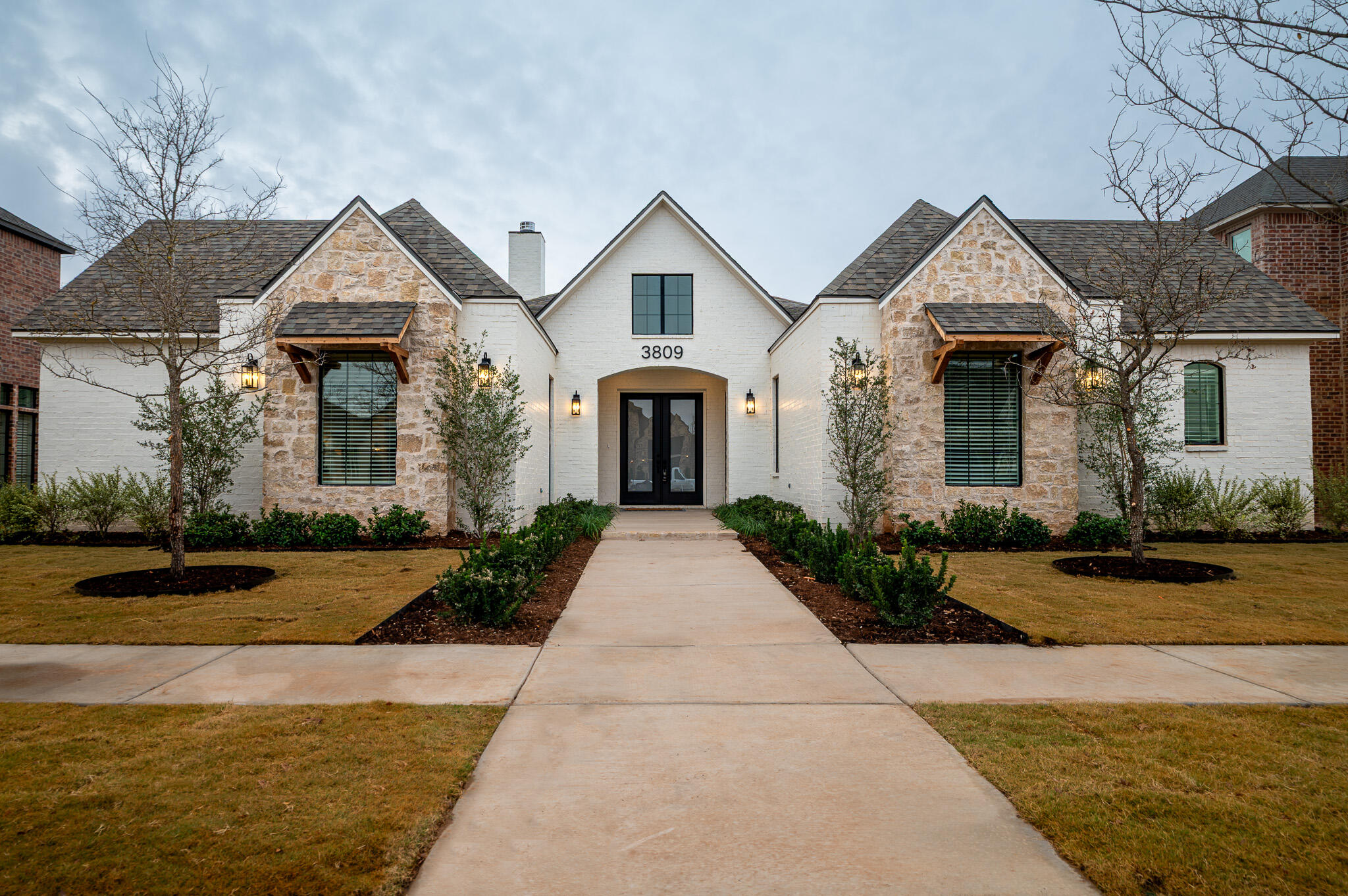 front view of a house and a yard