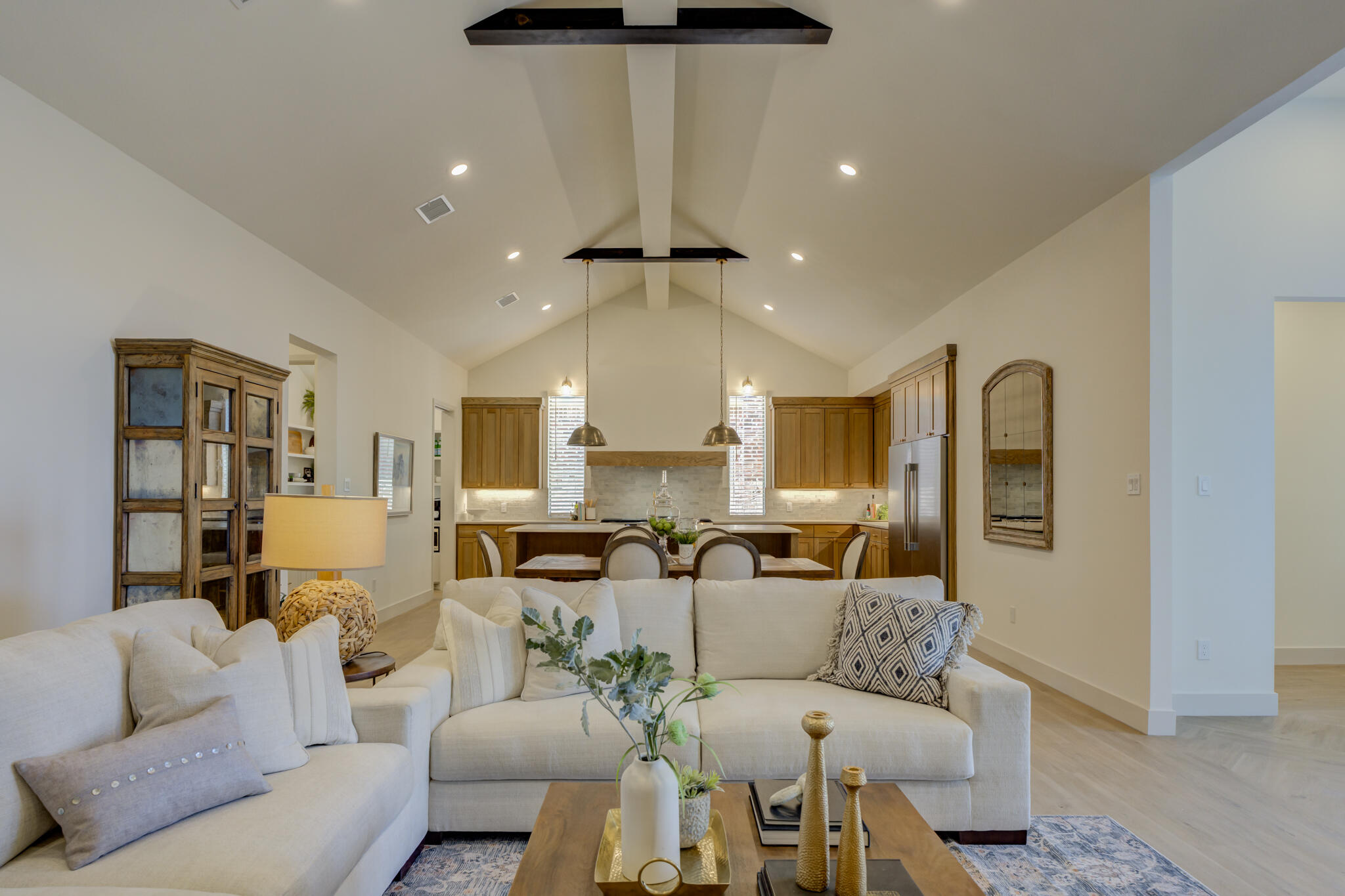 3809 126th Street Lubbock, TX 79423 - Photo 11 of 58 a living room with furniture and a chandelier
