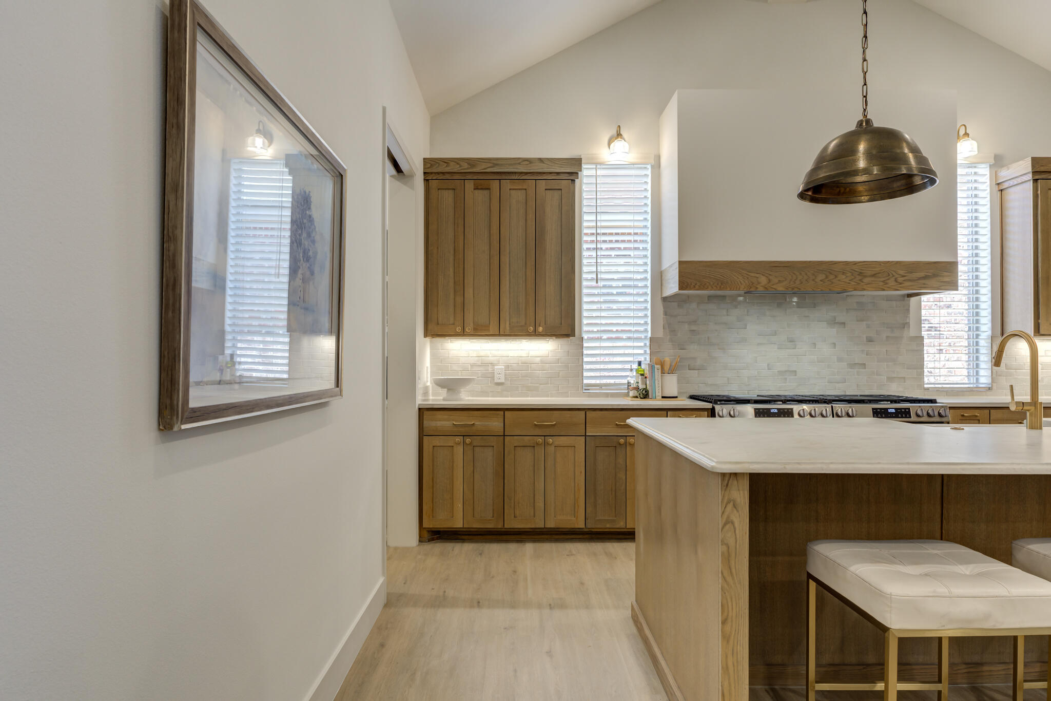 3809 126th Street Lubbock, TX 79423 - Photo 16 of 58 a kitchen with a stove and a sink