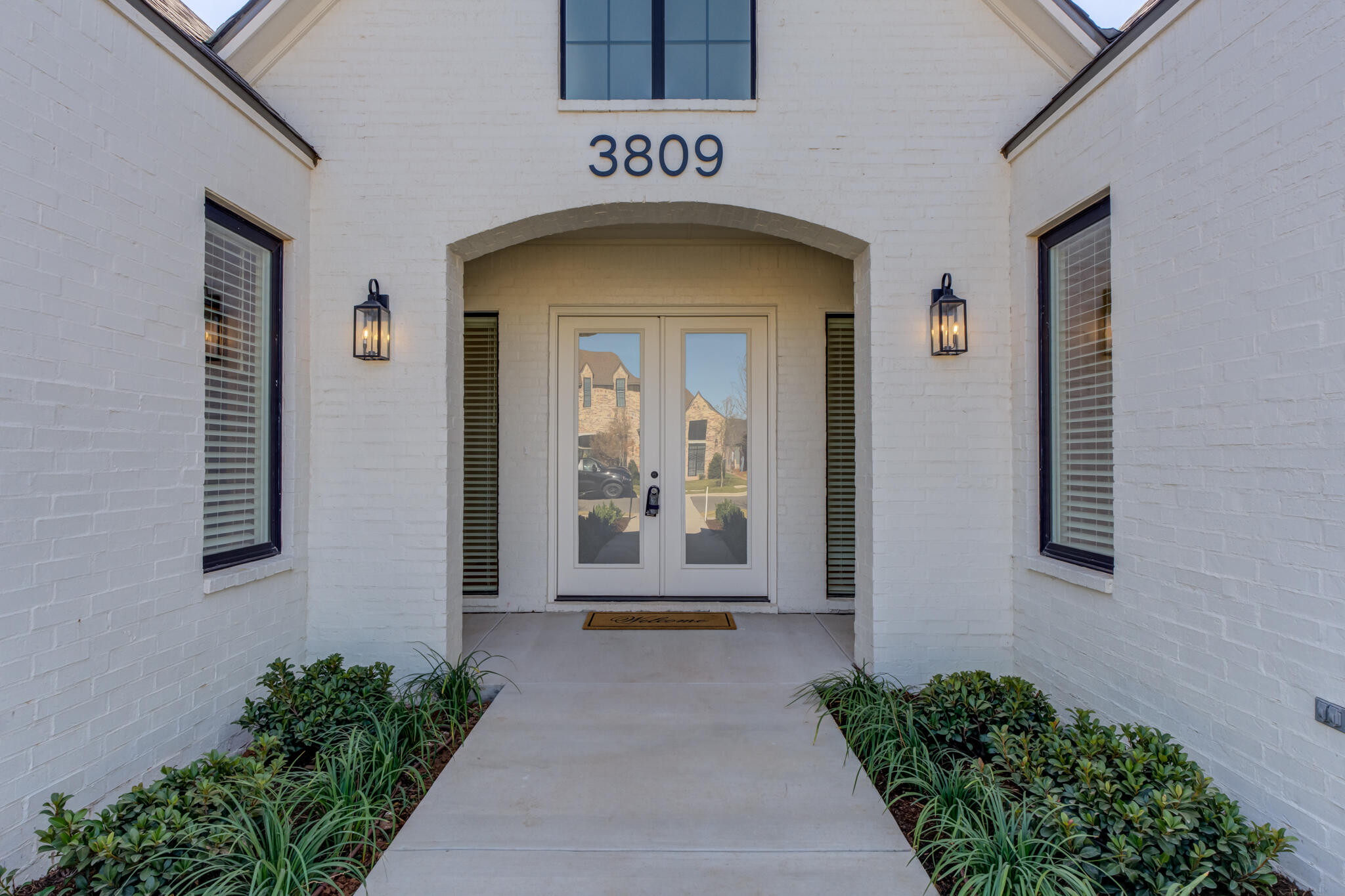 3809 126th Street Lubbock, TX 79423 - Photo 2 of 58 a view of a door with brick walls