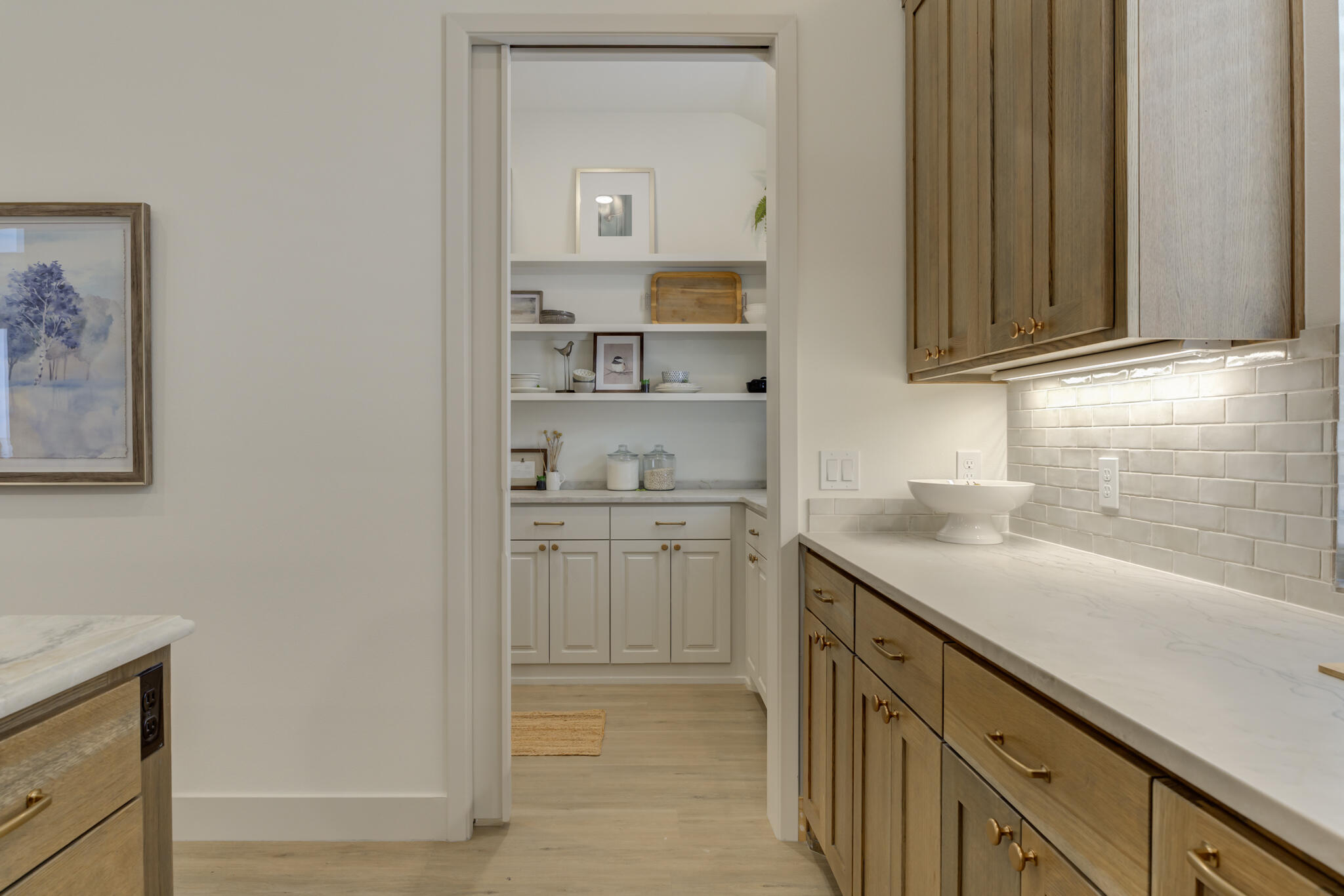3809 126th Street Lubbock, TX 79423 - Photo 24 of 58 a kitchen with a sink and cabinets