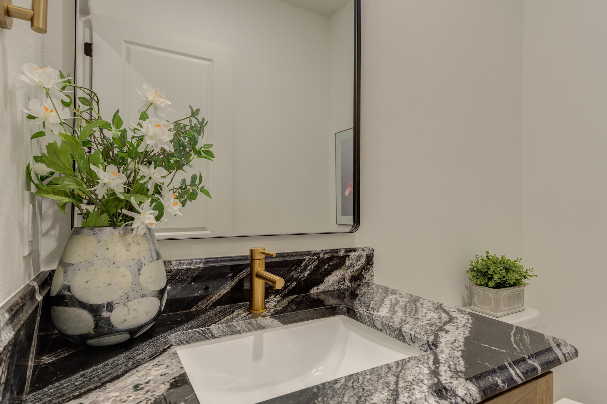 3809 126th Street Lubbock, TX 79423 - Photo 31 of 58 a vase of flowers sitting on a table