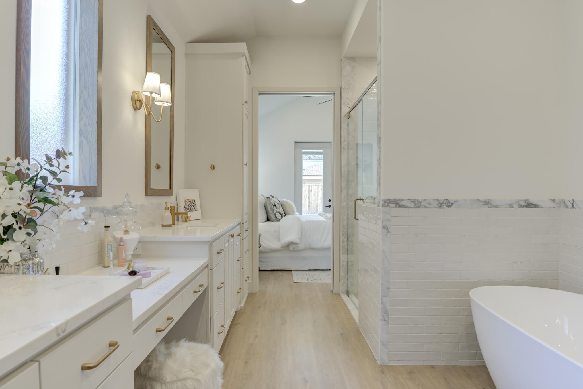 3809 126th Street Lubbock, TX 79423 - Photo 41 of 58 a bathroom with a tub sink and mirror